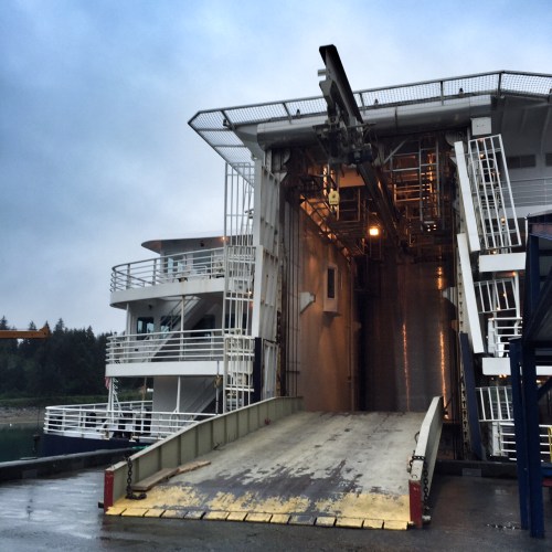 A huge elevator brought vehicles up from the car deck